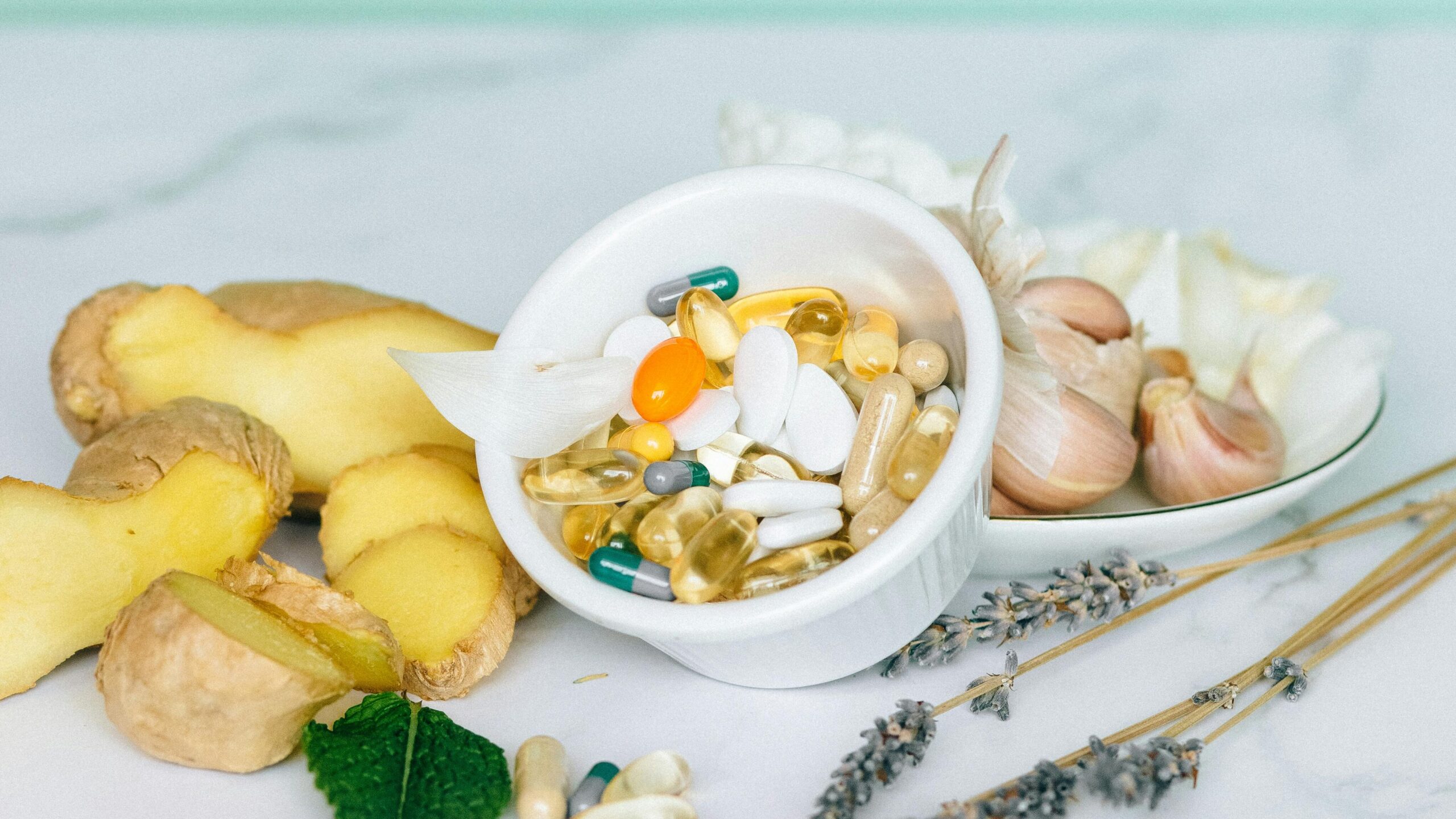 A selection of natural supplements featuring ginger, garlic, and herbs for holistic health benefits.